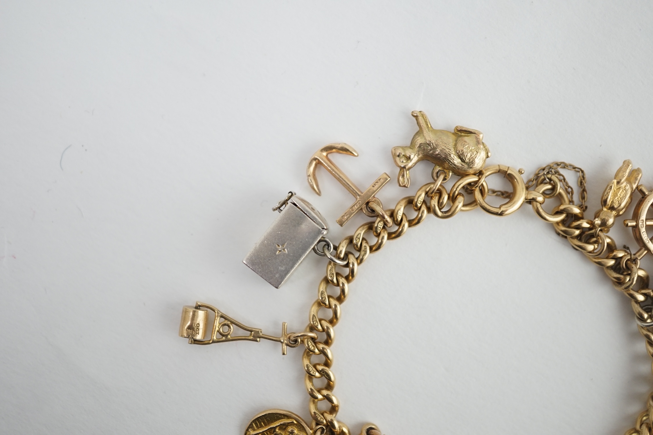 A 18ct gold charm bracelet